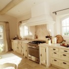 white and stone French country kitchen in Provence - via Atticmag