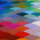 csniff test - contemporary tufted rug with multicolor fishscale motif - betterlivingthroughdesign via atticmag