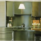 Stainless steel kitchen by Bulthaup -Hamptons Cottages & Gardens via Atticmag