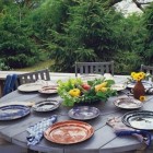 mixed pattern - outdoor setting of mixed pottery tableware by cera mix studios via Atticmag