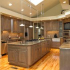 driftwood gray traditional kitchen with black-glazed cabinets - adelphi kitchens via Atticmag