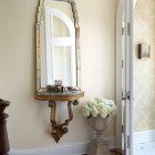 small square Turkish rug in a foyer - Coburn Architecture via Atticmag