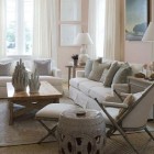 A flat-woven dhurrie style rug layered over sisal carpet Mrs. Howard Personal Shopper via Atticmag