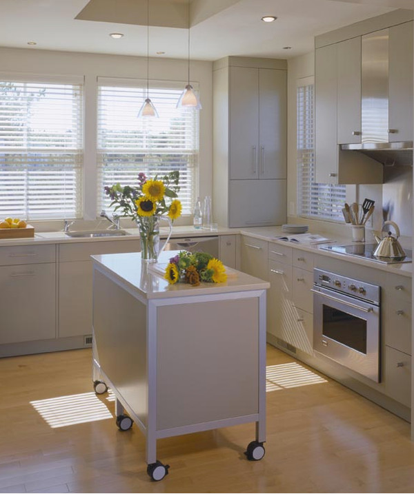 neutral contemporary kitchens - pale taupe cabinets in a modern kitchen - Hutker Architects via Atticmag