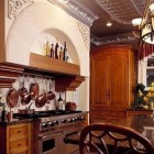 tin tile ceiling kitchen with antiques and elaborate detailing - via Atticmag