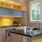 gray and yellow kitchen with yellow custom embossed Heath Tile backsplash - Heath via Atticmag