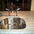 D shape prep sink with runnels in a marble counter with Samuel Heath bridge faucet - Atticmag
