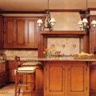 custom glazed maple cabinets with granite topped island - BH&G via Atticmag