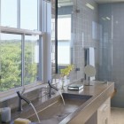 big bathroom sink - double size cast concrete master bathroom sink with double faucets - Hutker Architects via Atticmag