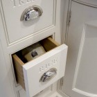 monogramming kitchens - Tom Howley cabinets with words carved onto the drawers - via Atticmag