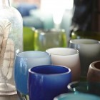colorful handblown glass holders for votives and flowers by glassybaby via Atticmag
