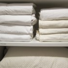 laundry soap test - freshly laundered cotton sheets in my linen closet - Atticmag