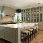 mega storage kitchen cabinets - massive china storage cabinet in a Texas kitchen - vfinehomes via Atticmag