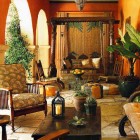 swinging porch sofa - Anglo Indian style swinging porch sofa by Madeline Stuart via Atticmag