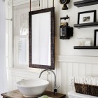 suspended mirror in a remodeled Victorian bathroom - Antonio Martins via Atticmag