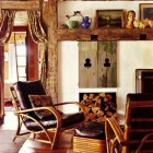 antique window shutters made into tv niche cabinet doors - country home via atticmag