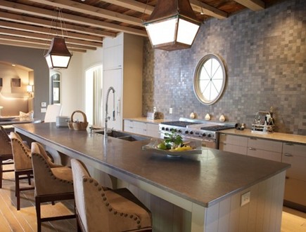 round interior window in a transitional kitchen - Style Blueprint via Atticmag