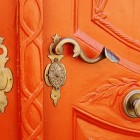 orange-painted front door-thefrenchtangerine via atticmag