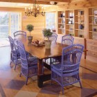 blue painted furniture in the dining room of a Massachusetts beach house - hutker architects via atticmag