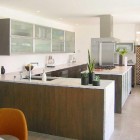 walnut kitchen - contemporary walnut and marble kitchen by Jill Crawford via Atticmag