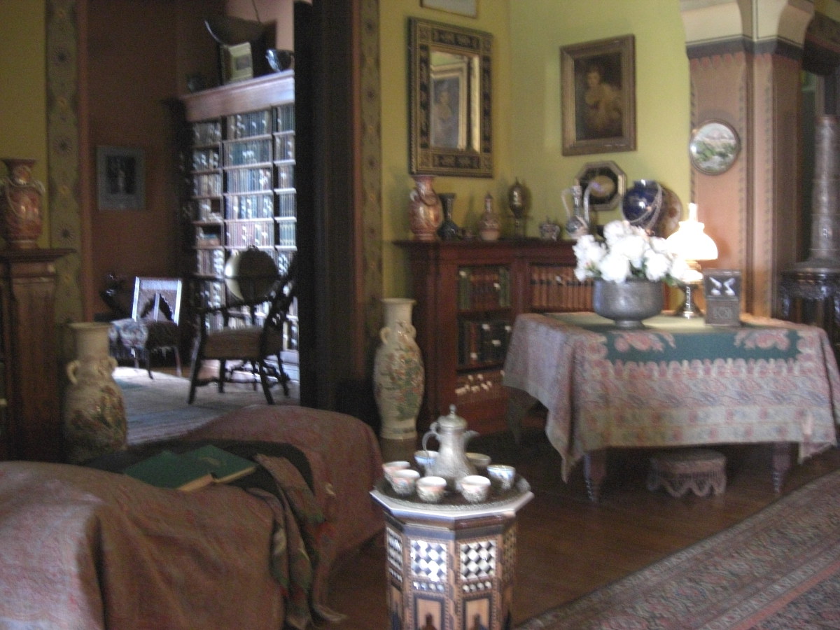 Olana - draped furniture in the mansion's main room painted with color selected by Frederic Church - Atticmag