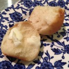 buttermilk cloverleaf rolls - two sections of a warm baked cloverleaf roll after the cook already ate one - Atticmag.com