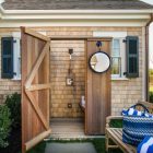 rustic outdoor shower - with detachable hand spray and foot-washing spigot behind the hgtv 2015 Martha's Vineyard dream home - hgtv via atticmag